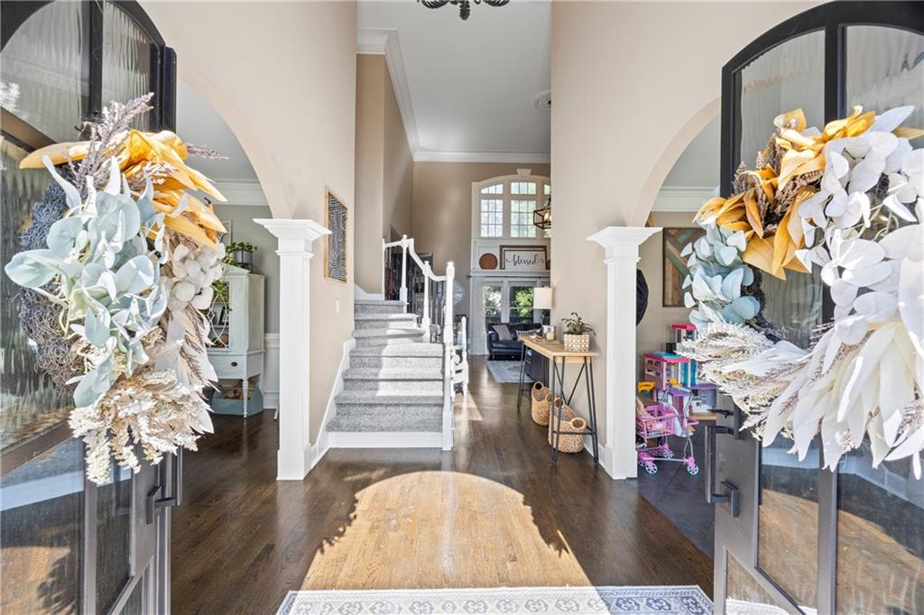 3420 Millwater Crossing Northeast Dacula, GA 30019 - Photo 6 of 54 a view of entryway with wooden floor