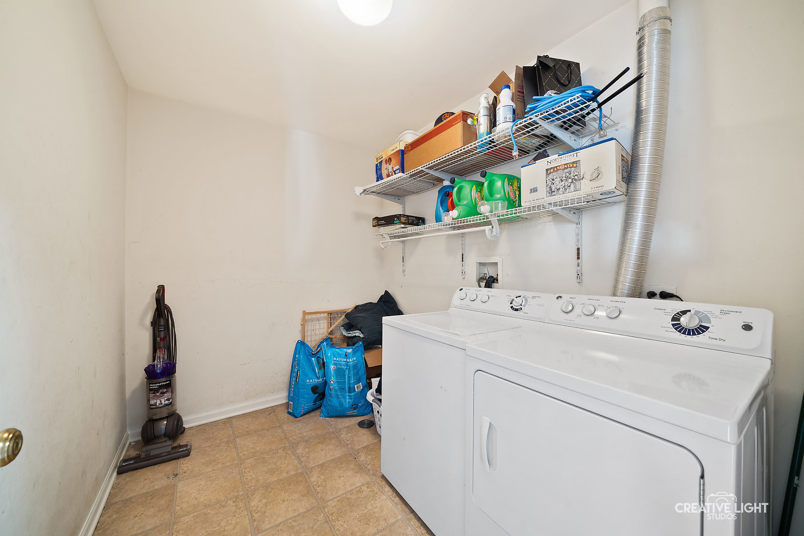 1987 West Cobblestone Road Romeoville, IL 60446 - Photo 17 of 20 a utility room with dryer and washer
