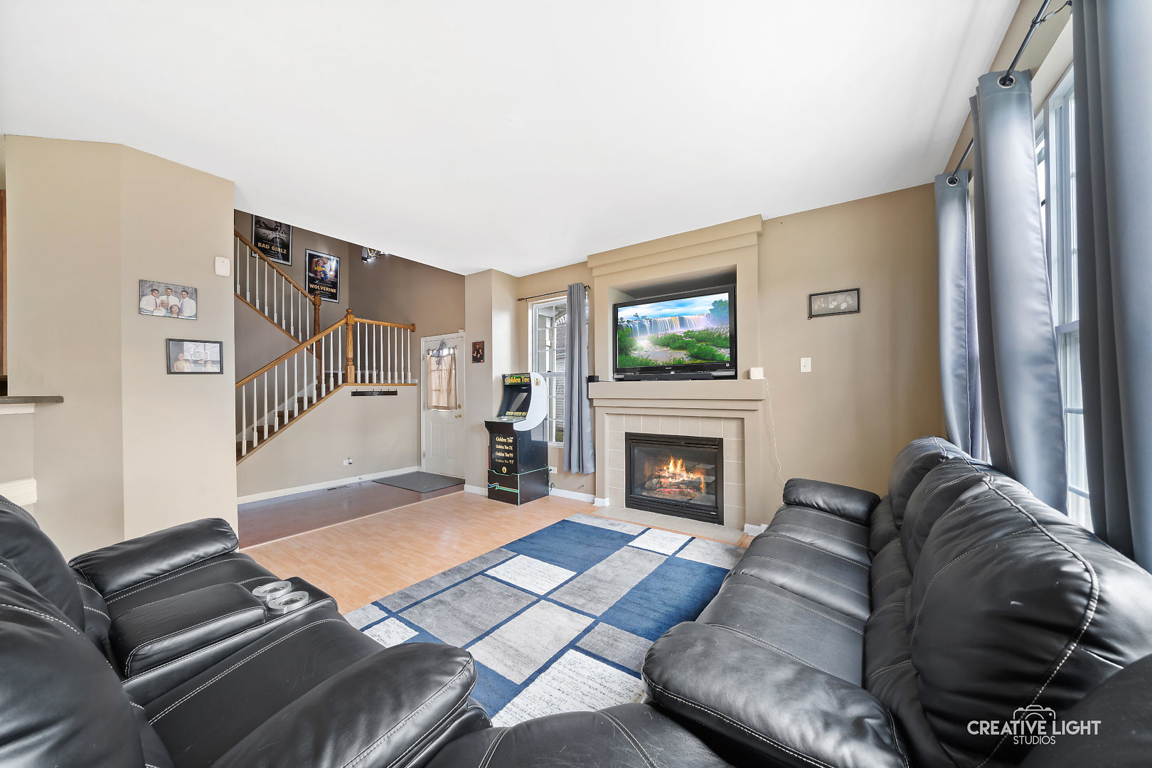 1987 West Cobblestone Road Romeoville, IL 60446 - Photo 5 of 20 a living room with furniture and a fireplace