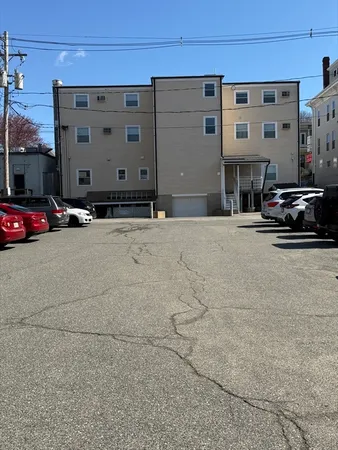 a car parked in front of a building