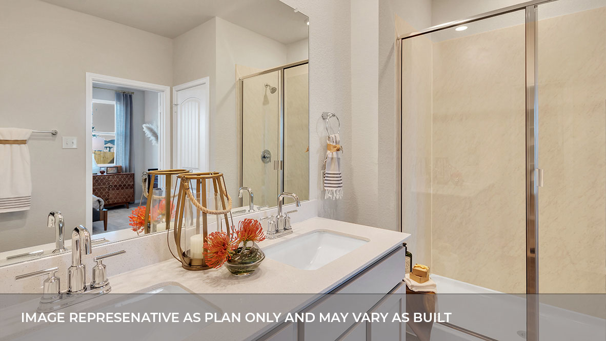 183 Balmorhea Street Kyle, TX 78640 - Photo 28 of 34 a bathroom with a sink and a mirror