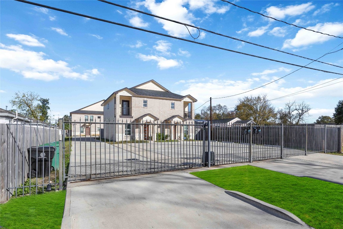4903 Mallow Street, Unit A Houston, TX 77033 - Photo 2 of 10 a view of a wrought iron fences in front of house