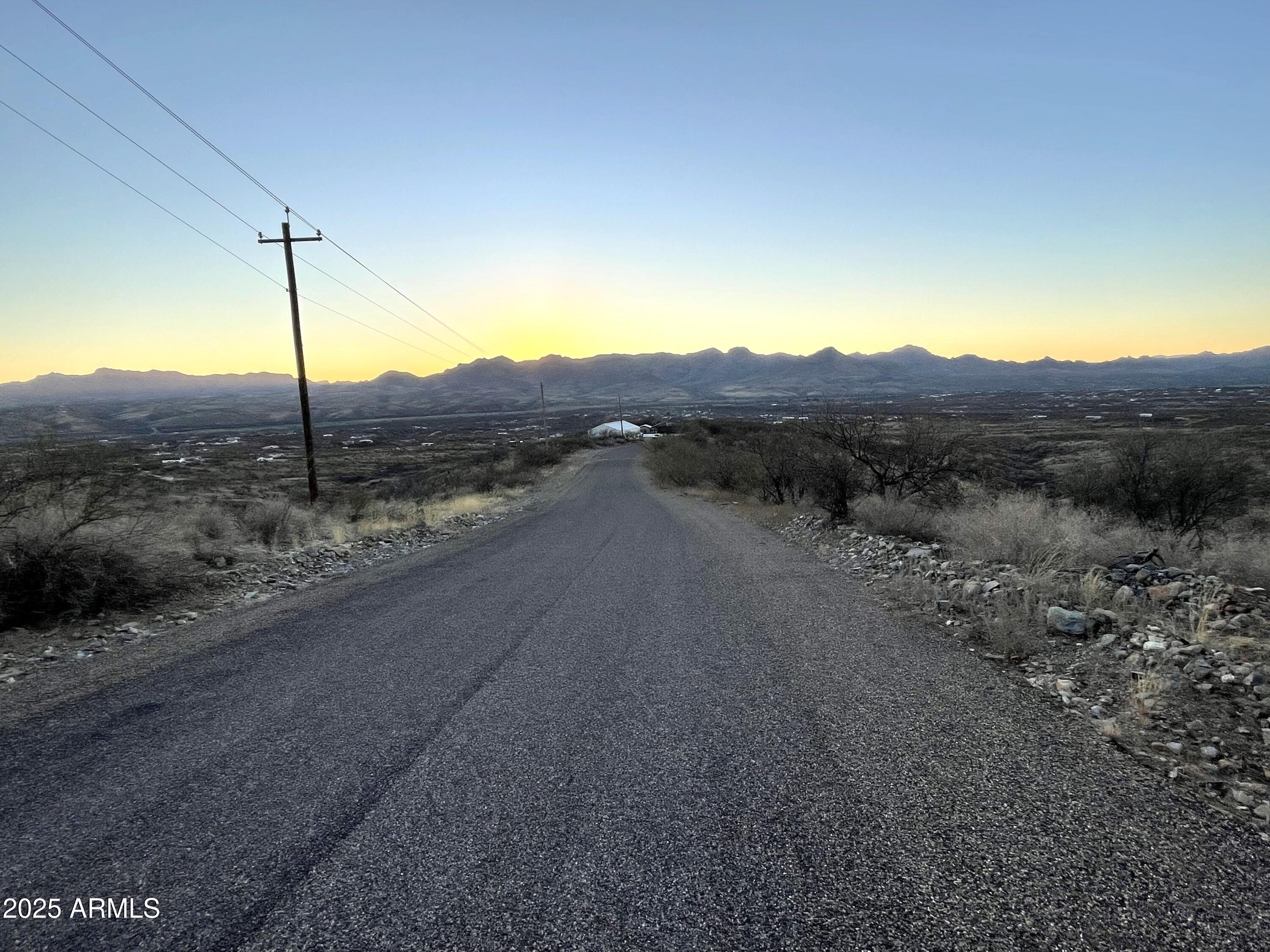 1742 Ruta Caravela, Unit 10 Rio Rico, AZ 85648 - Photo 8 of 8 a view of a road with a road