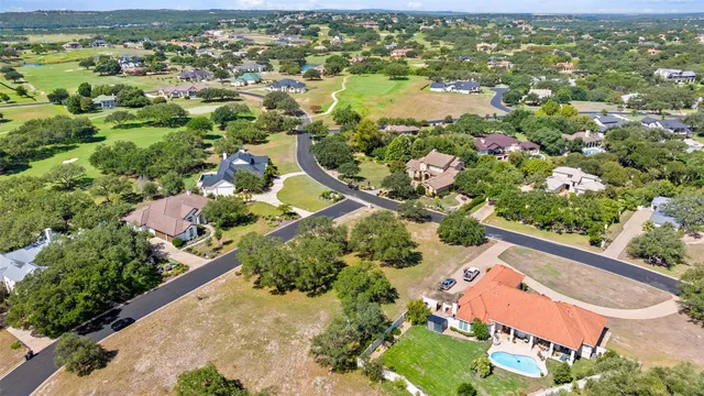 an aerial view of a house with a garden