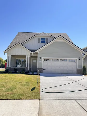 a swimming pool with outdoor seating