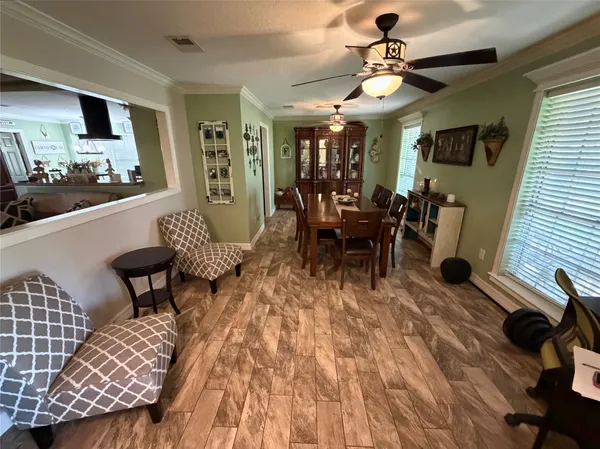 a view of a dining room with furniture