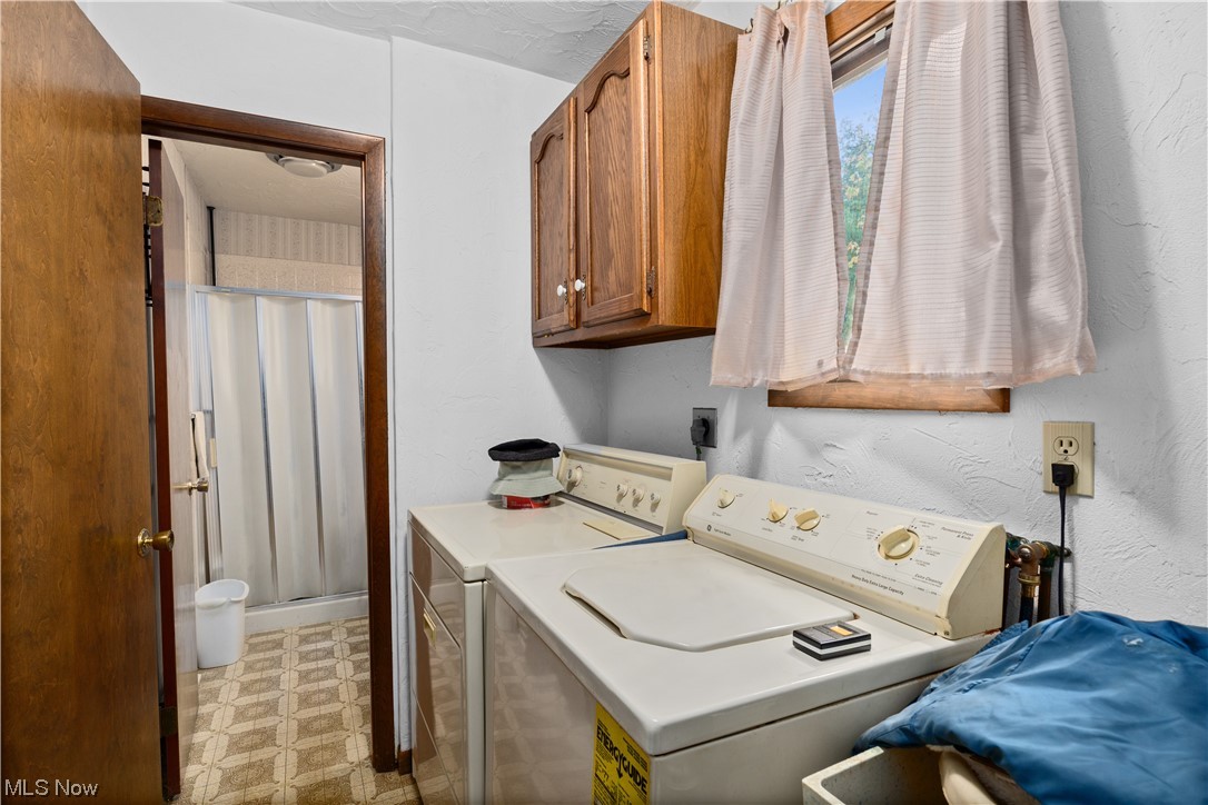 32051 Avon Road Avon, OH 44011 - Photo 24 of 32 Clothes washing area featuring washer and dryer