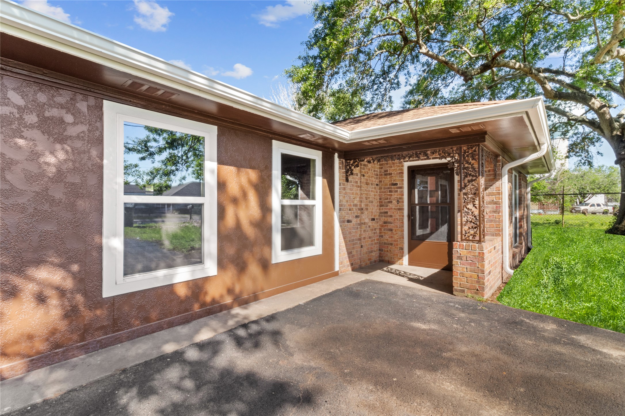 4201 Sevan Street Bacliff, TX 77518 - Photo 15 of 22 a view of a two room with large windows and plants