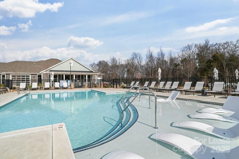 13511 Montoy Way, Unit A2 Charlotte, NC 28273 - Photo 13 of 34 a view of a swimming pool with outdoor seating
