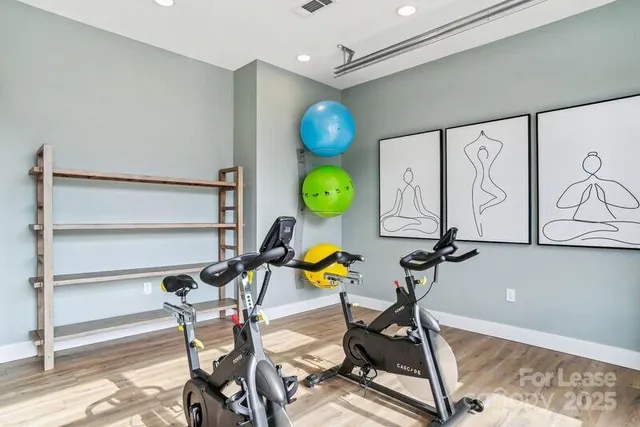 a view of a room with chairs and table