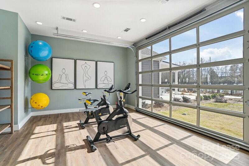 13511 Montoy Way, Unit A2 Charlotte, NC 28273 - Photo 18 of 34 a view of a room with gym equipment