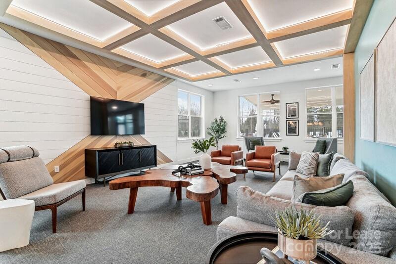 13511 Montoy Way, Unit A2 Charlotte, NC 28273 - Photo 34 of 34 a living room with furniture and a large window