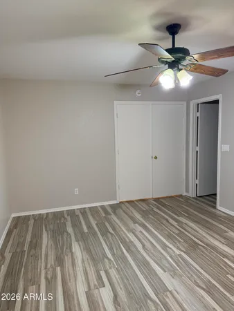 a view of an empty room with a window