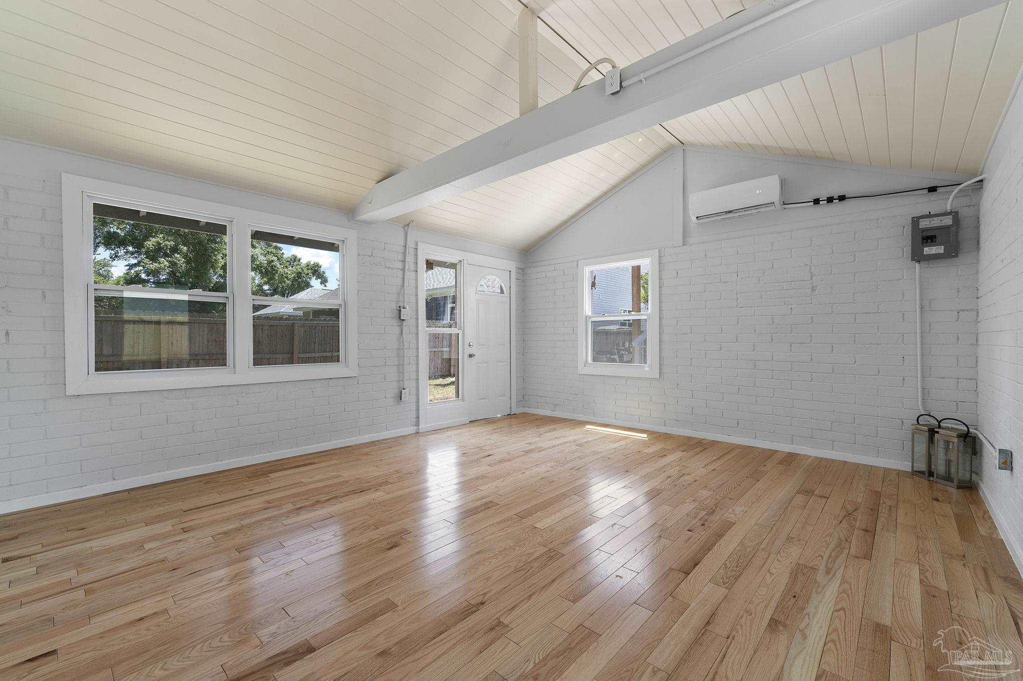 306 South N Street Pensacola, FL 32502 - Photo 11 of 37 a view of empty room with wooden floor and fan