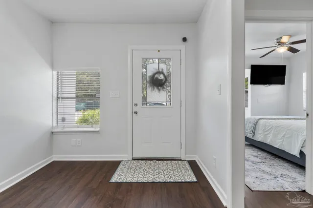 a view of an empty room and window