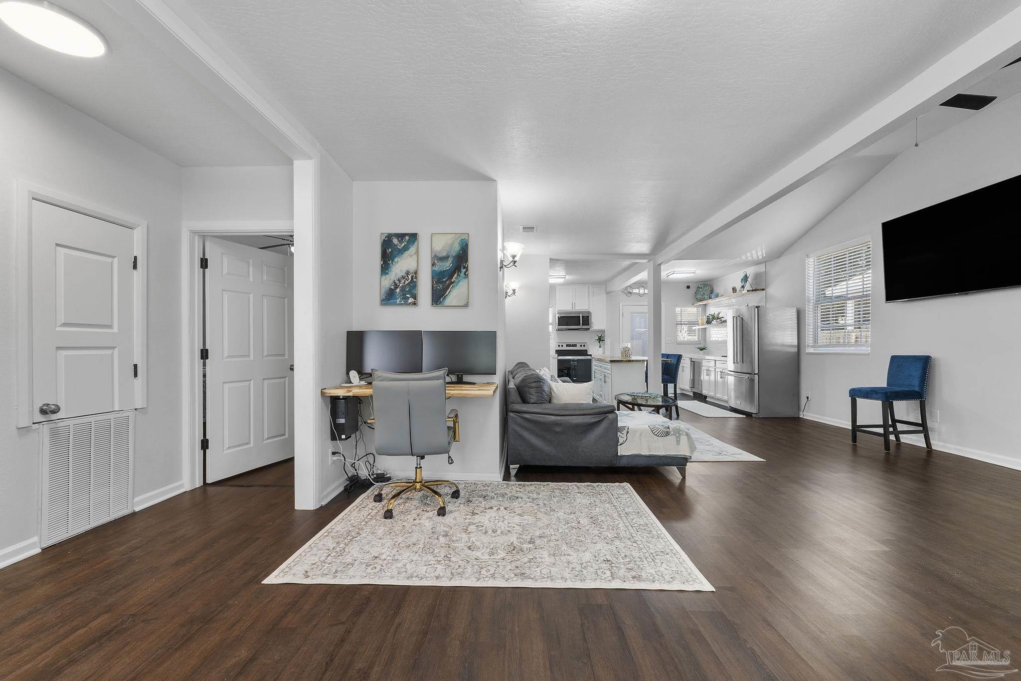 306 South N Street Pensacola, FL 32502 - Photo 27 of 37 a living room with furniture and a wooden floor
