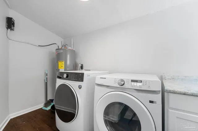a utility room with dryer and washer