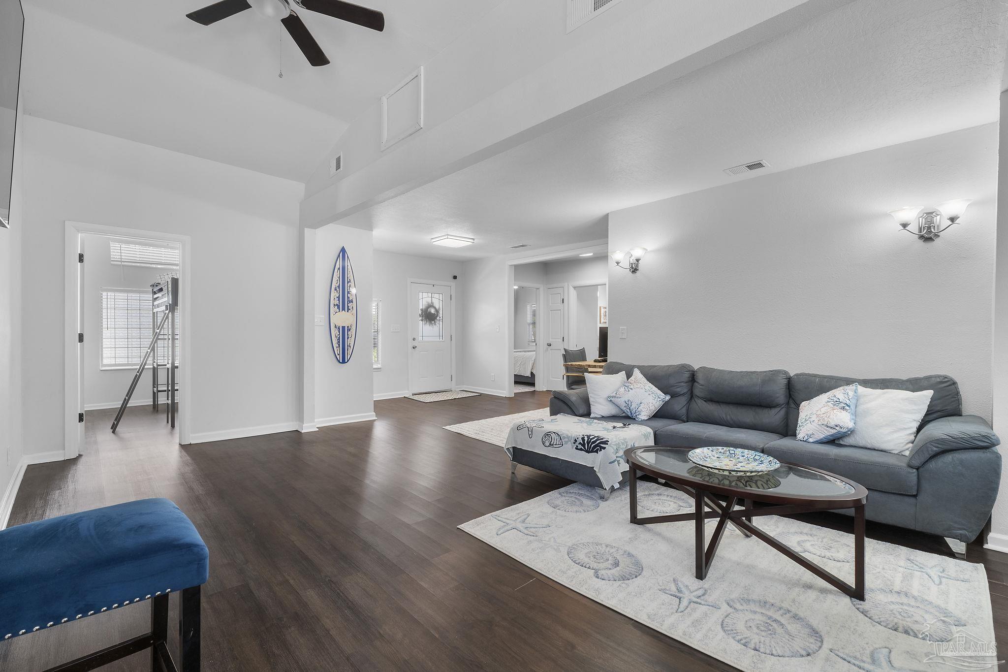 306 South N Street Pensacola, FL 32502 - Photo 31 of 37 a living room with furniture and a wooden floor