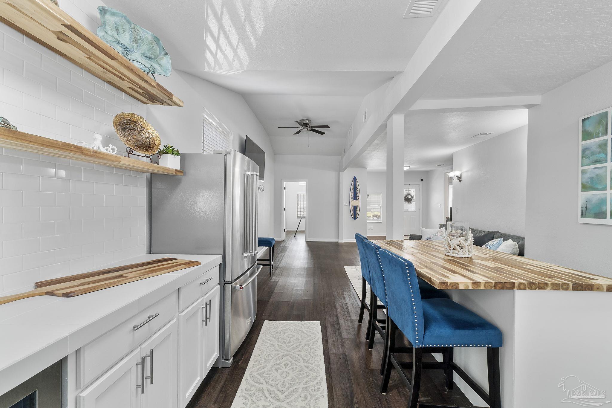 306 South N Street Pensacola, FL 32502 - Photo 36 of 37 a large kitchen with a table and chairs