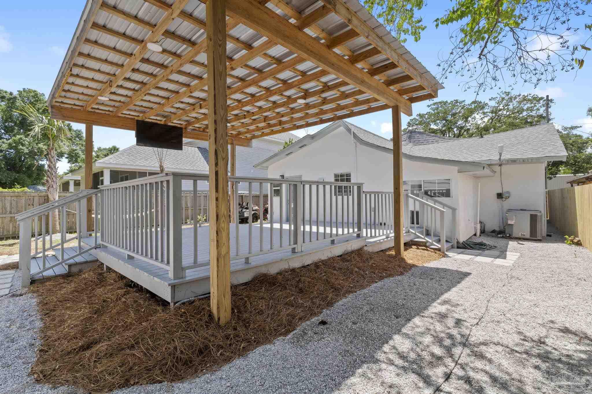 306 South N Street Pensacola, FL 32502 - Photo 7 of 37 a view of a house with backyard and deck