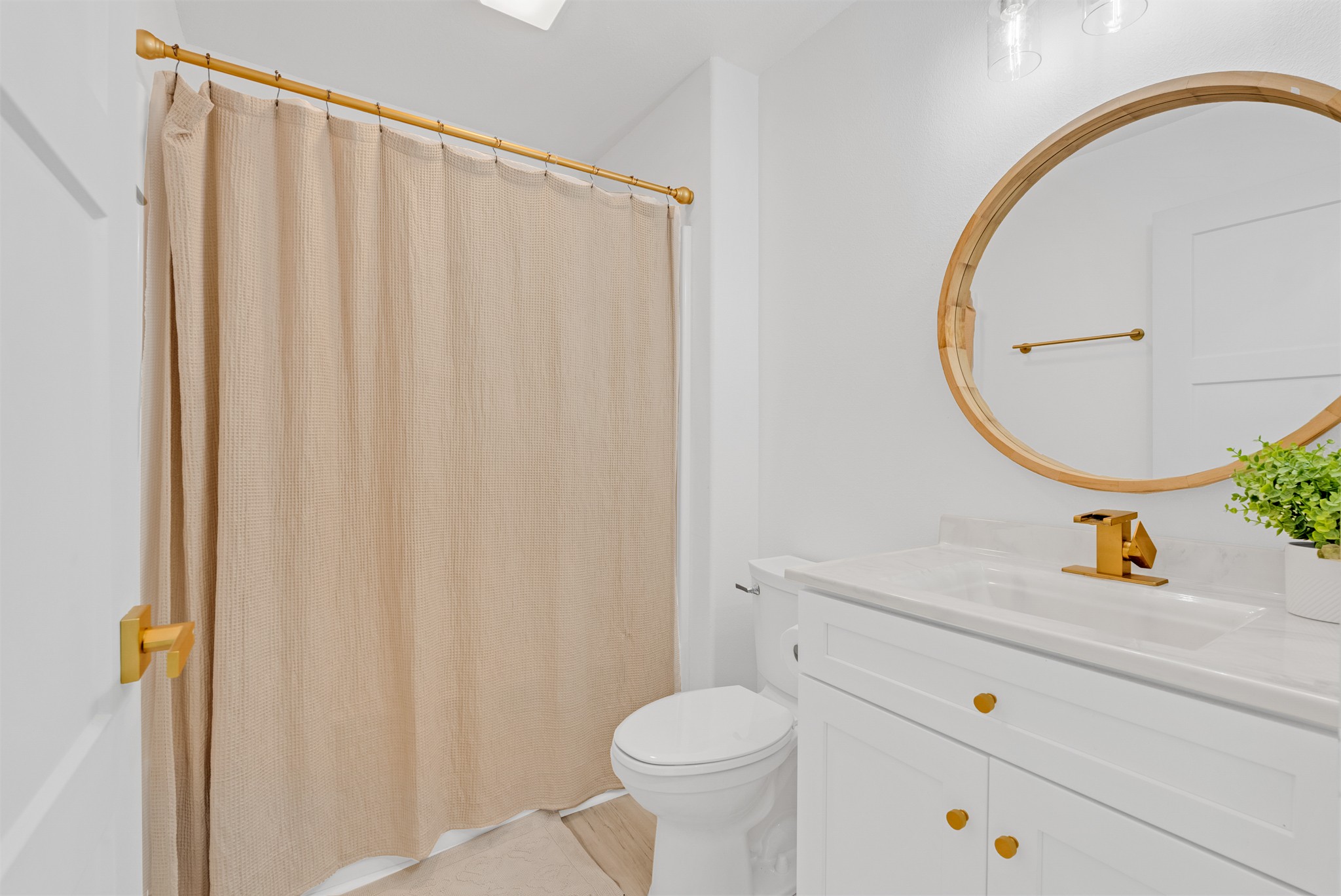 4733 Window Cliff Road Baxter, TN 38544 - Photo 19 of 25 a bathroom with a sink a toilet and a mirror