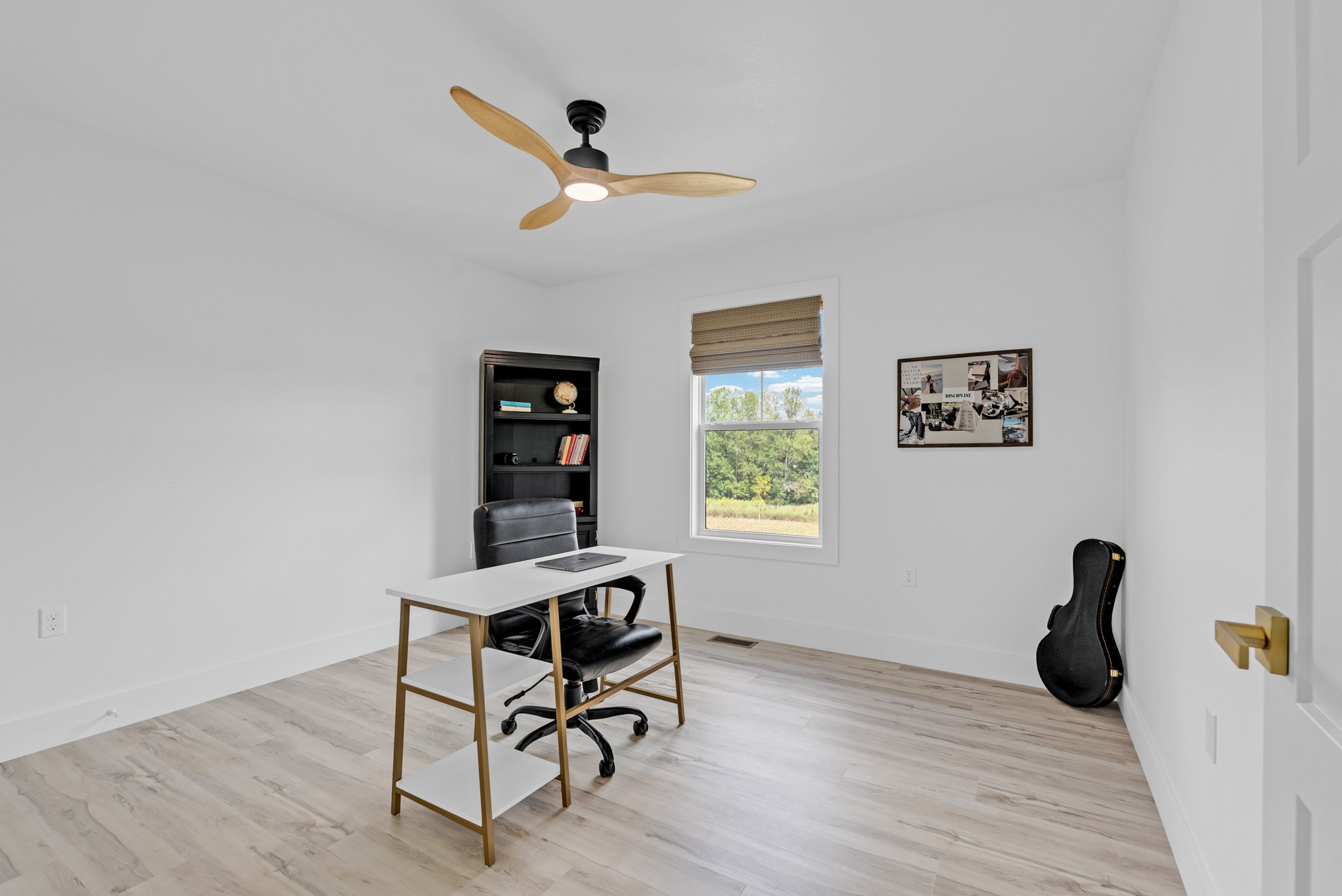 4733 Window Cliff Road Baxter, TN 38544 - Photo 20 of 25 a view of a workspace with furniture and a window
