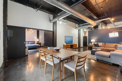 a view of a dining room with furniture