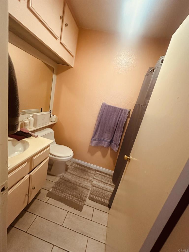 891 West San Ysidro Boulevard, Unit 9 San Ysidro, CA 92173 - Photo 11 of 18 a view of bathroom with a toilet
