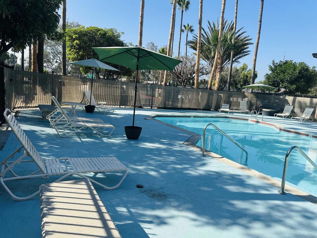 891 West San Ysidro Boulevard, Unit 9 San Ysidro, CA 92173 - Photo 17 of 18 a view of a backyard with sitting area