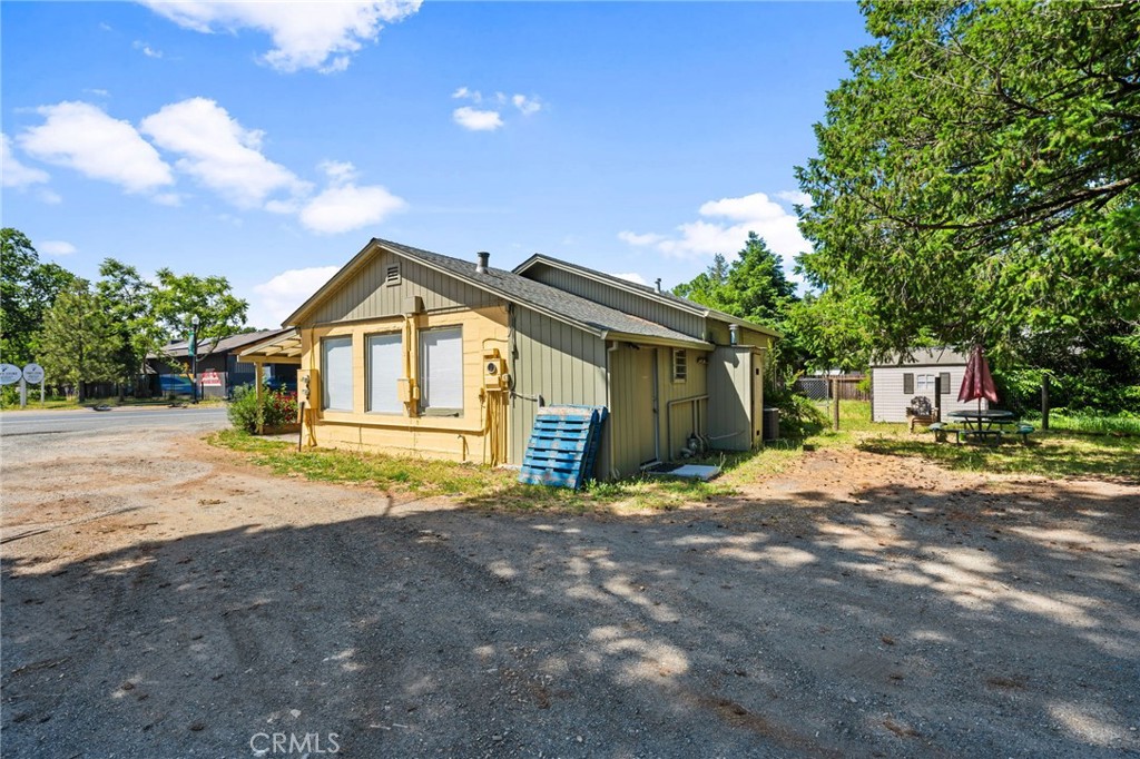 21298 Calistoga Road Middletown, CA 95461 - Photo 4 of 20 a front view of a house with a yard and garage