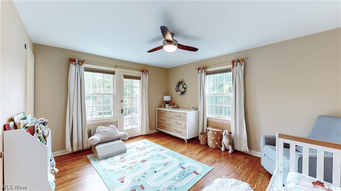 3658 Traver Road Shaker Heights, OH 44122 - Photo 21 of 33 Bedroom with ceiling fan, light hardwood / wood-style flooring, french doors, and access to outside