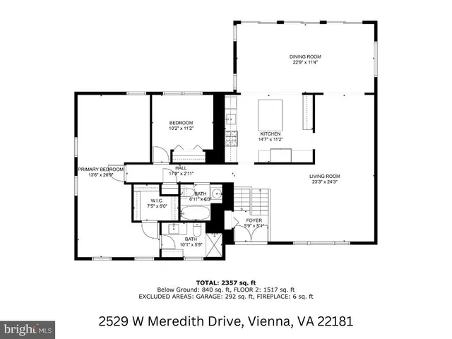 a couple of flower plants and large trees