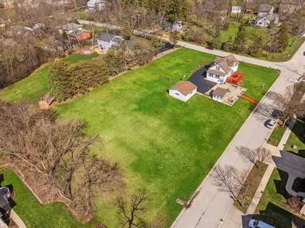 an aerial view of a house with a garden
