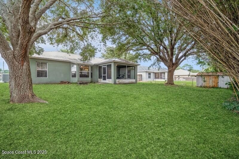 6475 Addax Avenue Cocoa, FL 32927 - Photo 29 of 31 a front view of house with a garden