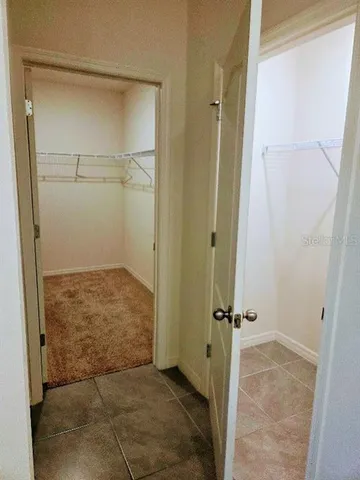 a view of a room that has a window in it