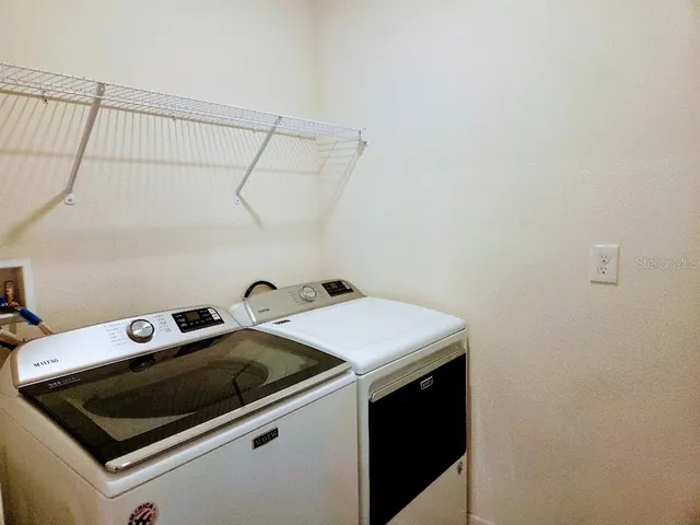 a view of a swimming pool with an ocean