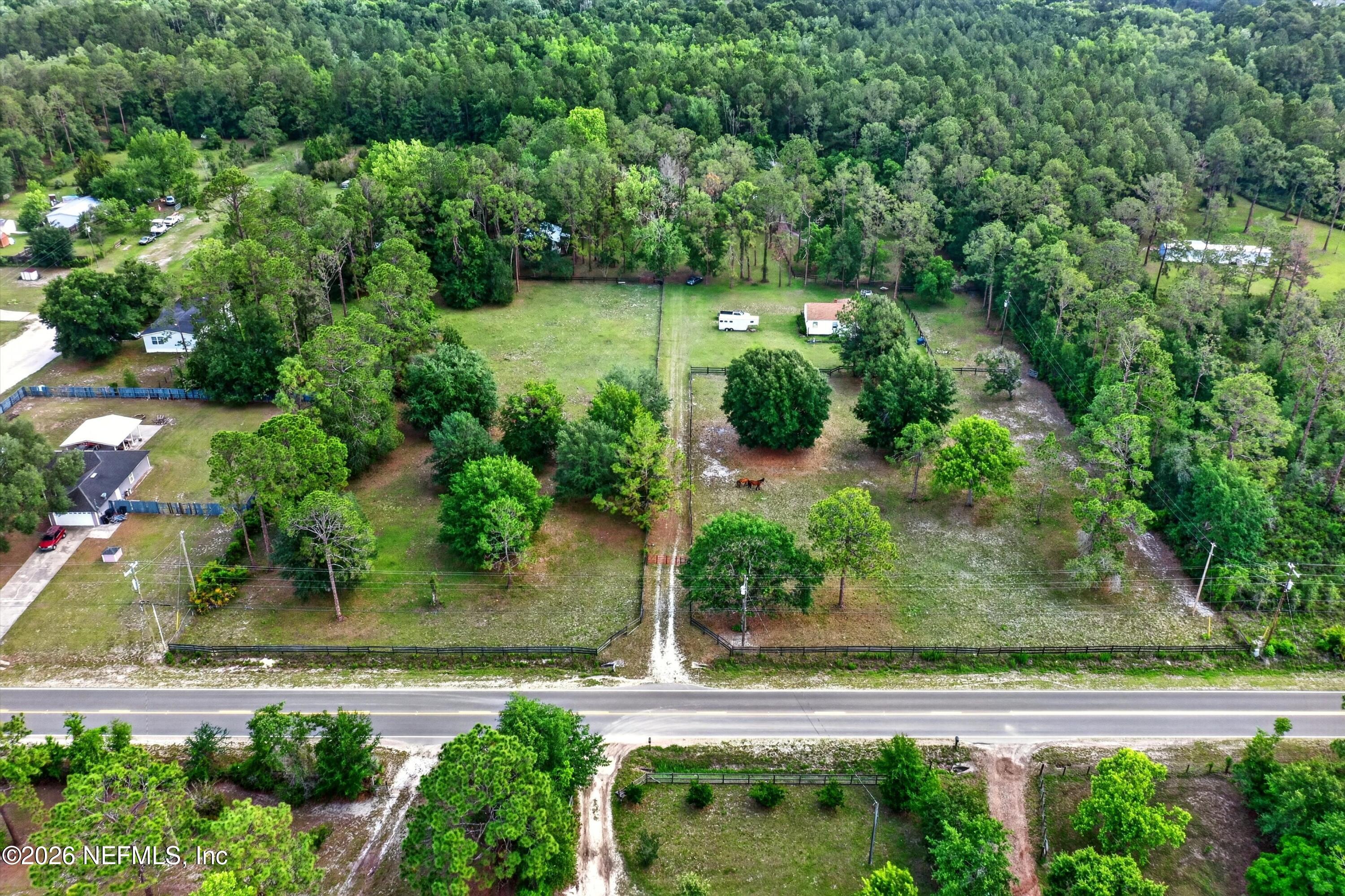 5214 Carter Spencer Road Middleburg, FL 32068 - Photo 25 of 50 an aerial view of a house with a yard
