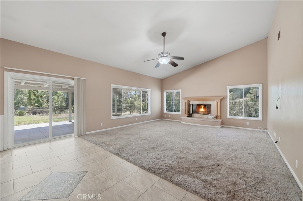 32245 Refa Street Wildomar, CA 92595 - Photo 3 of 69 a view of livingroom with furniture and chandelier fan