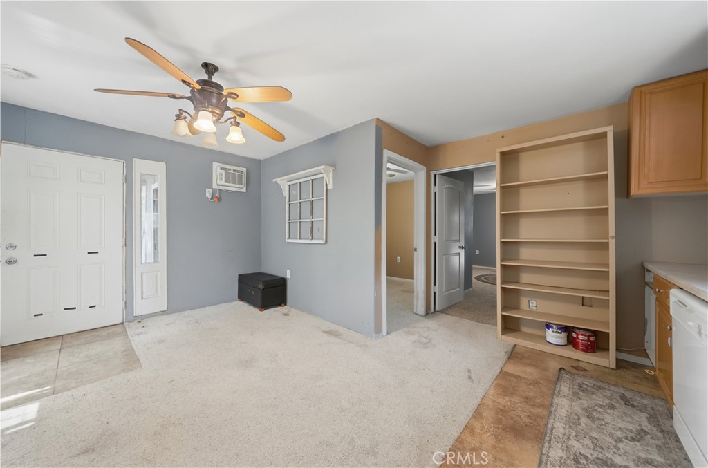 32245 Refa Street Wildomar, CA 92595 - Photo 39 of 69 a bedroom with a bed and a chandelier
