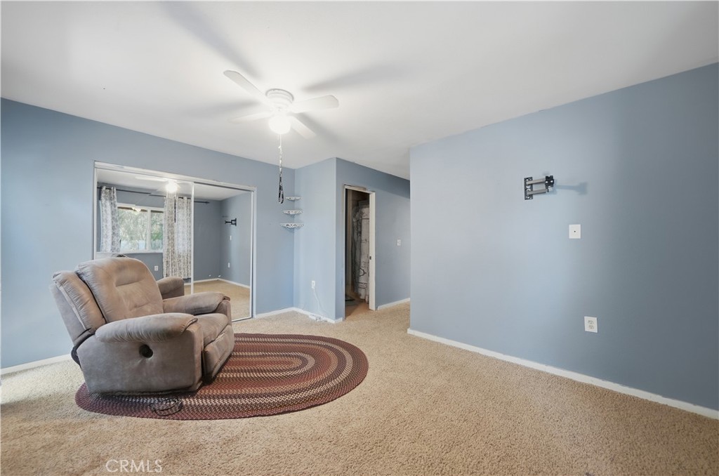 32245 Refa Street Wildomar, CA 92595 - Photo 42 of 69 a living room with furniture and a window