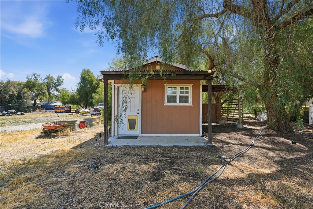 32245 Refa Street Wildomar, CA 92595 - Photo 47 of 69 a view of a house with a yard