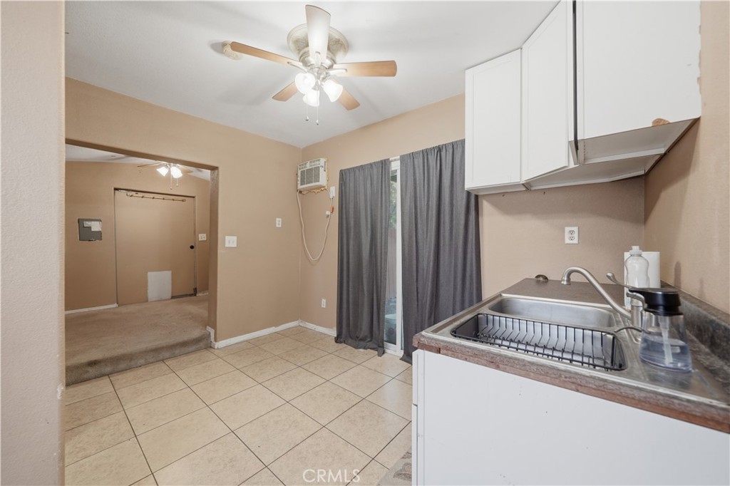 32245 Refa Street Wildomar, CA 92595 - Photo 49 of 69 a bathroom with a sink a mirror and a shower