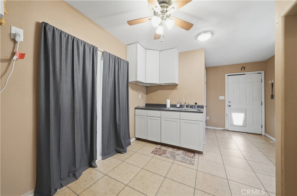 32245 Refa Street Wildomar, CA 92595 - Photo 50 of 69 a kitchen with stainless steel appliances a refrigerator and microwave