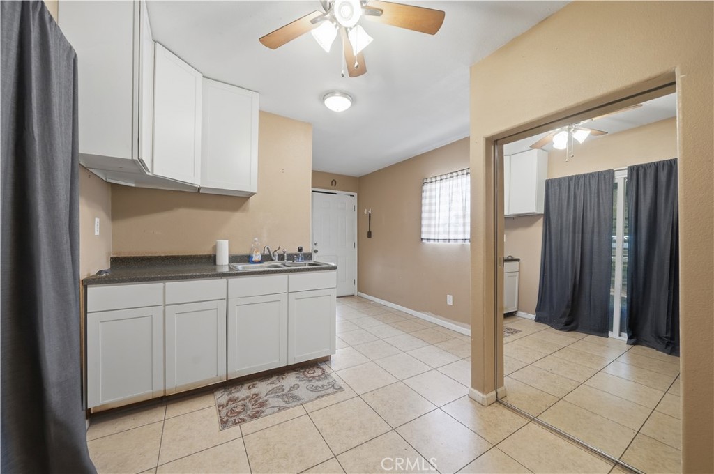 32245 Refa Street Wildomar, CA 92595 - Photo 51 of 69 a kitchen with a sink and cabinets