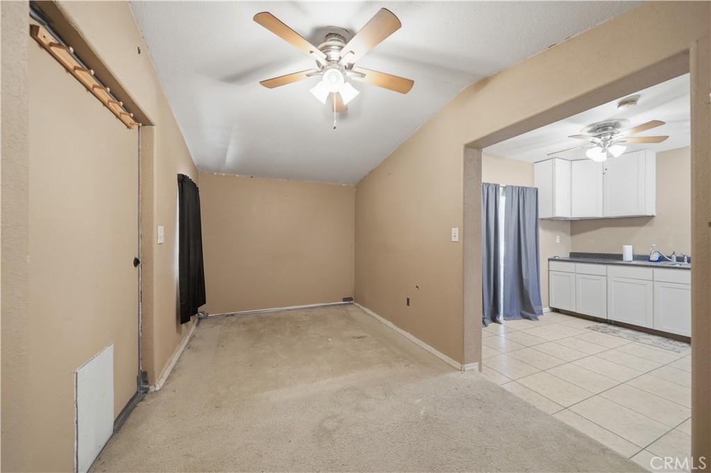 32245 Refa Street Wildomar, CA 92595 - Photo 53 of 69 a view of a kitchen with a sink and a stove top oven