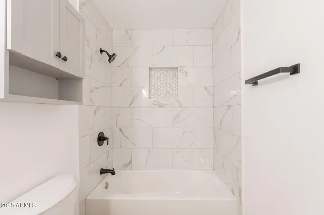 a bathroom with a bathtub