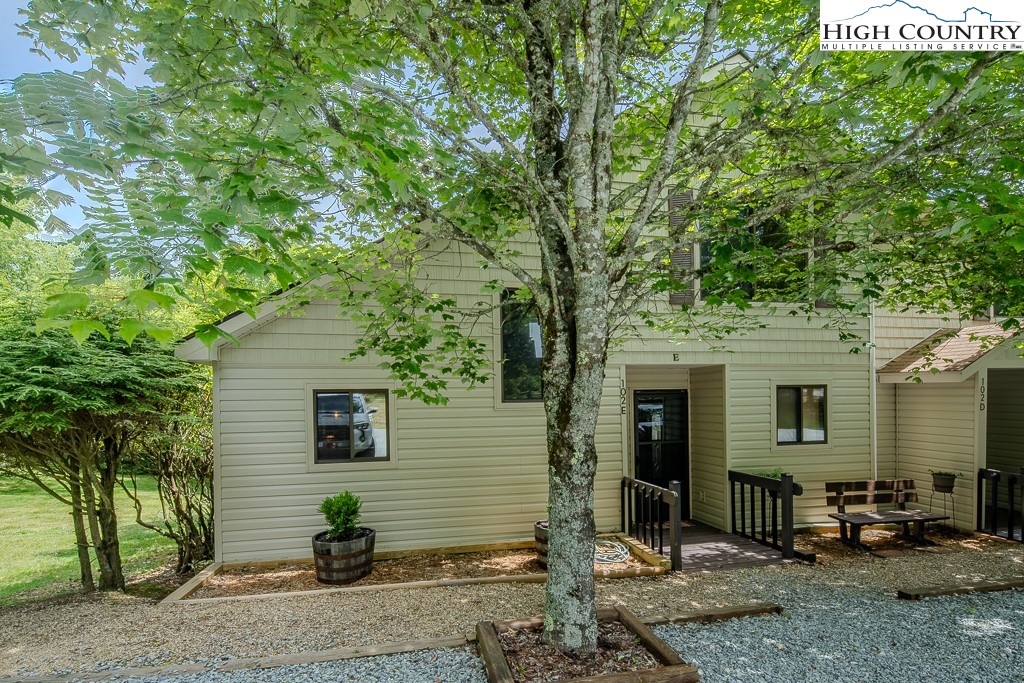 102 Spring Branch Road, Unit E Beech Mountain, NC 28604 - Photo 3 of 40 a view of a house with a patio