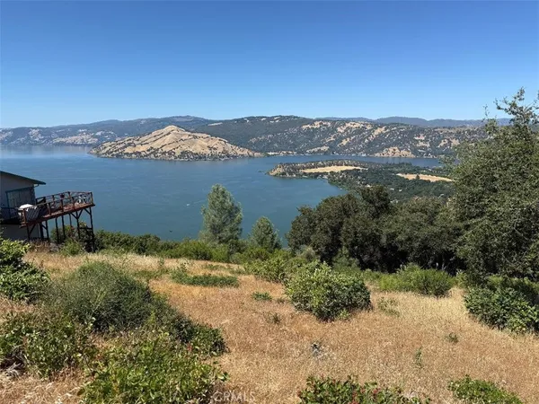 a view of a lake with a mountain in the background
