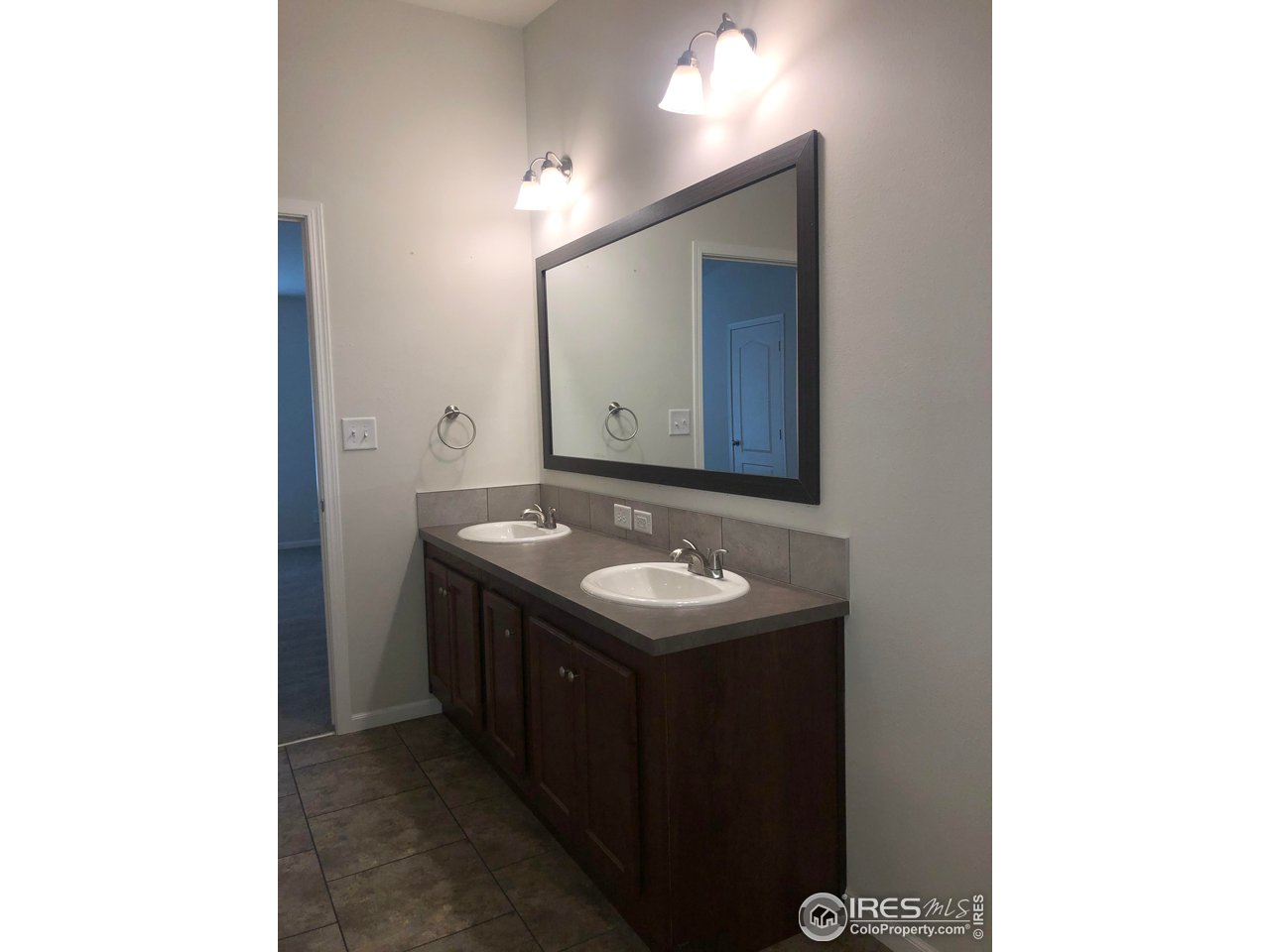 41 South Ranch Road Wiggins, CO 80654 - Photo 14 of 24 master bath