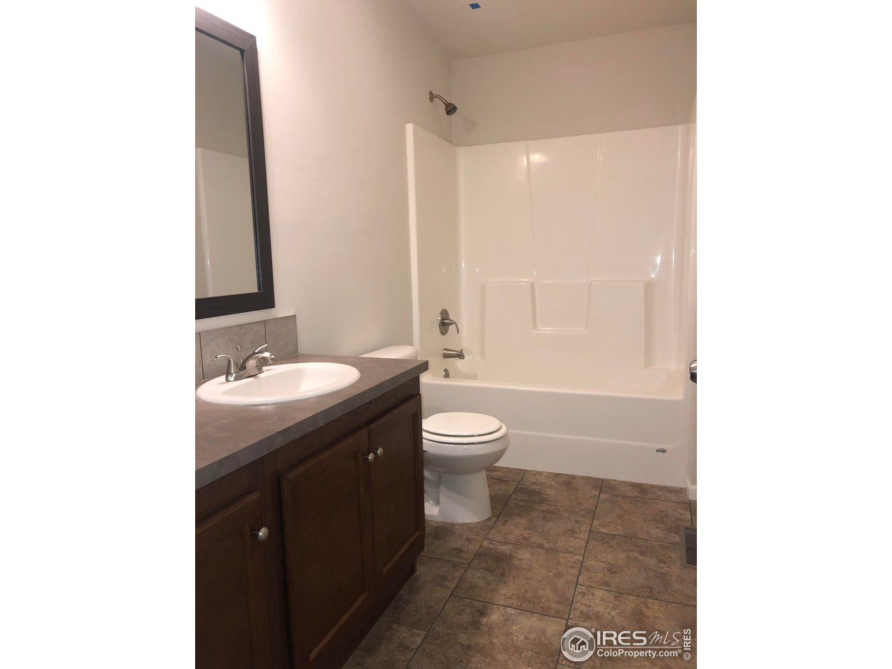 41 South Ranch Road Wiggins, CO 80654 - Photo 16 of 24 Master bath